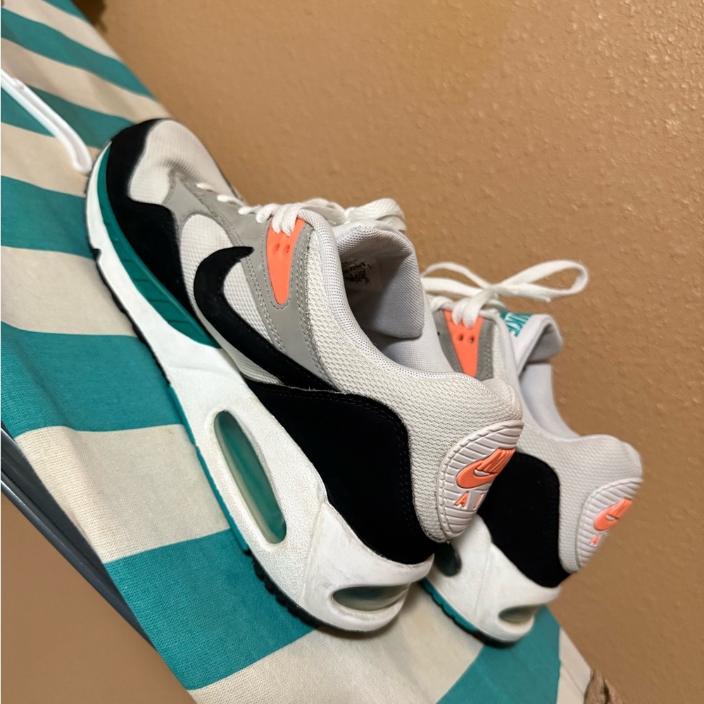 Nike Kids' White and Black Sneakers with Orange Accents
